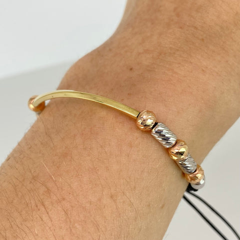Pulsera tejida Herraje Entorchado / Cilindros BD 5mm 6uni / Hilo Negro Tres oros 18k 1,81 Gr *