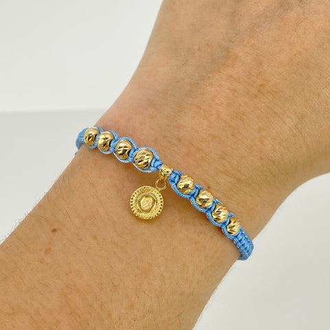 Pulsera tejida Dije Letra O / BD 8uni 5mm / Hilo Celeste Oro amarillo 18k 1,22 Gr *