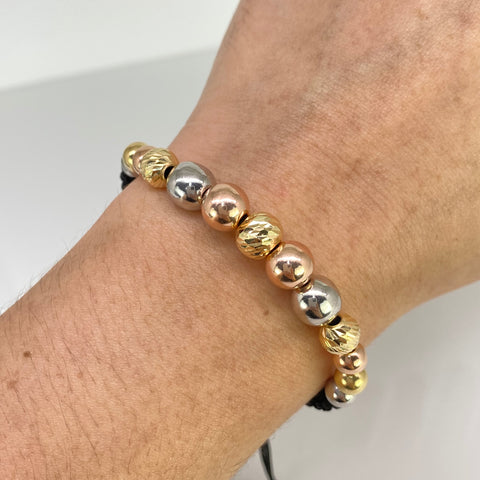 Pulsera tejida Bolas Lisas 8- 6 mm Y Diamantada 8 -7mm  Hilo Negro Tres oros 18k 3,19 Gr *
