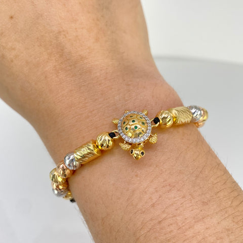 Pulsera tejida Tortuga / Cilindros / Bolas Diamantadas 14 Und 6 mm Hilo Negro Tres oros 18k 5,72 Gr †