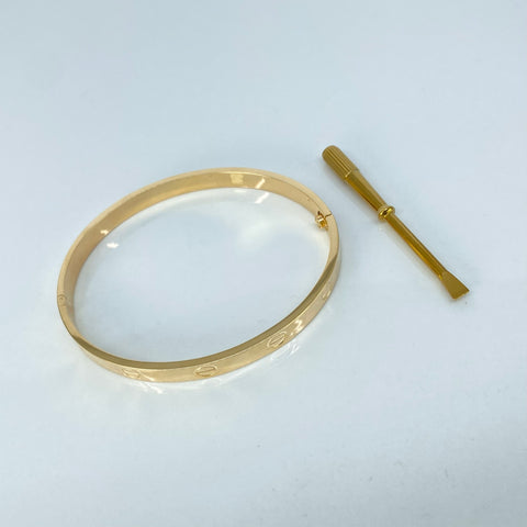 Pulso ● Aro Tornillo CT Oro amarillo 18k +3 / 7,42 Gr / 5,7 mm / 19,5 Cm *
