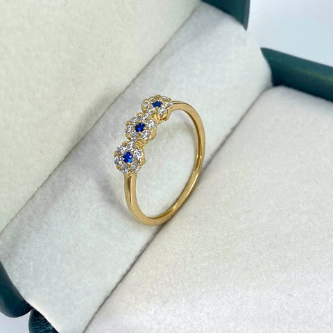 Anillo Flor Circones Blancos y Azules Oro amarillo 18k / Talla 7 1/4 / 1,75 Gr