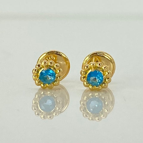 Topos Flor Circon Celeste Oro amarillo 18k 0,8 Gr / 5 mm  *