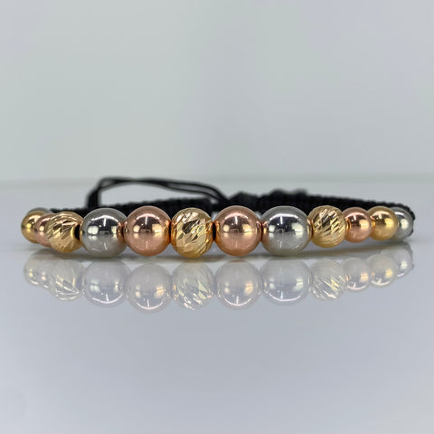 Pulsera tejida Bolas Lisas 8- 6 mm Y Diamantada 8 -7mm  Hilo Negro Tres oros 18k 3,19 Gr *