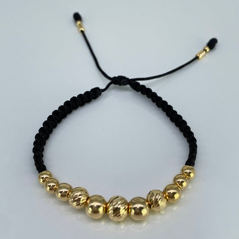 Pulsera tejida Bolas Lisas 7- 6 - 5 - 3 mm Y Diamantada 8 - 7 mm / Cilindros Hilo Negro Oro amarillo 18k 2,55 Gr *