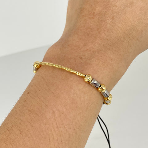 Pulsera tejida Tubo Entorchado BD 5mm 8uni Cilindros 6uni Hilo Negro Oro amarillo y Oro blanco 18k 2,05 Gr *