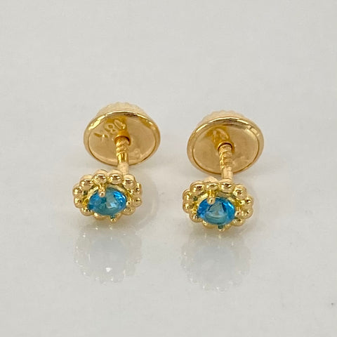 Topos Flor Circon Celeste Oro amarillo 18k 0,8 Gr / 5 mm  *