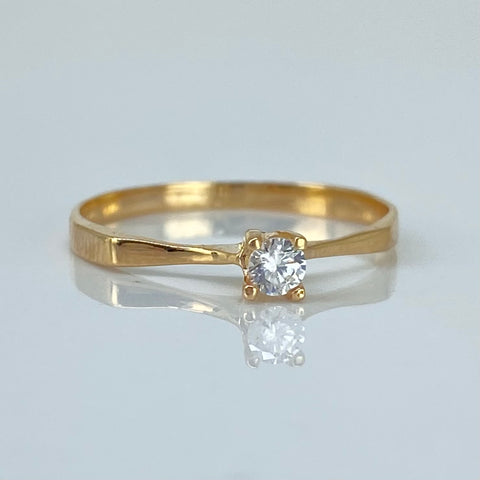 Anillo Solitario Linea Curva Circon Blanco Central Oro amarillo 18k / Talla 7 1/4 / 1,34 Gr *