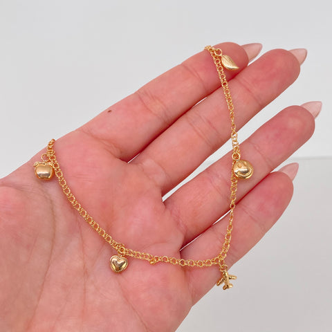 Tobillera Aro Seguido Dije Pluma/Carita/Avion/Corazon/Manzana/Luna Oro amarillo 3,85 Gr / 2,2 mm / 25,4 Cm