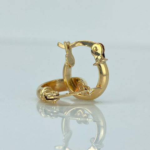 Candongas Semi Planas Redondas Oro amarillo 18k 1,25 Gr / 1,3 Cm