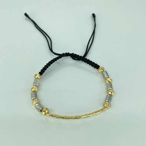 Pulsera tejida Tubo Entorchado BD 5mm 8uni Cilindros 6uni Hilo Negro Oro amarillo y Oro blanco 18k 2,05 Gr *