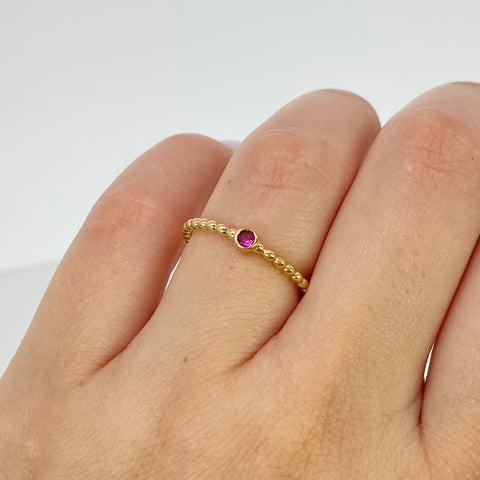 Anillo Solitario Entorchado Circon Fucsia Oro amarillo 18k / Talla 6 1/2 / 1,5 Gr *