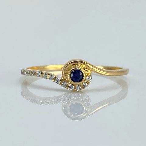 Anillo Cruzado Circones Blancos Y Azul Central Oro amarillo 18k / Talla 5 3/4 / 1,15 Gr