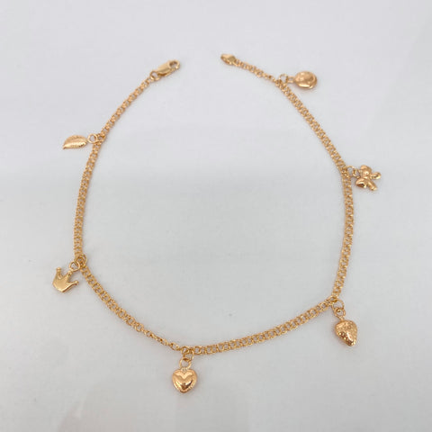 Tobillera Aro Seguido Dije Carita/Moño/Fresa/Corazon/Corona/Pluma Oro amarillo 3,85 Gr / 2,2 mm / 25,3 Cm *