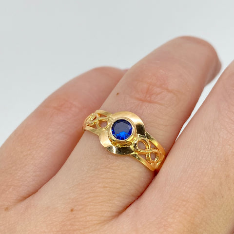 Anillo Circon Azul Infinitos Oro amarillo 18k / Talla 7 / 1,48 Gr