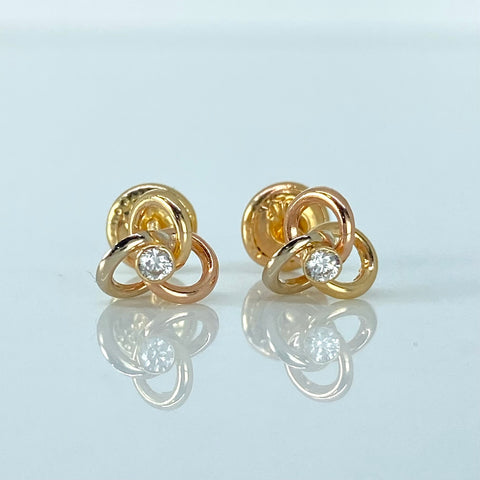 Topos Flor Circon Blanco Tres oros 18k 0,8 Gr / 7 mm  †