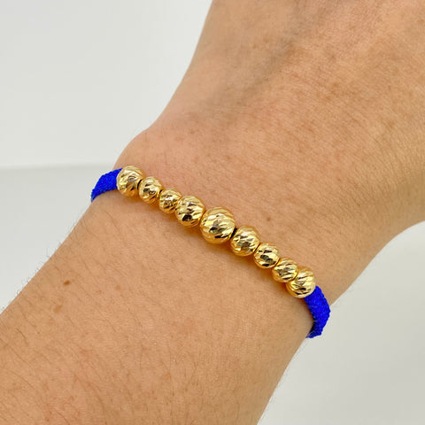 Pulsera tejida Bolas Diamantadas 9uni 7/6/5mm / Hilo Azul Oro amarillo 18k 1,19 Gr *
