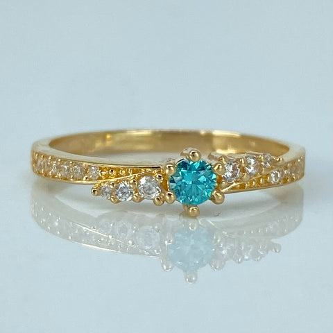 Anillo Solitario Circones Blancos Celeste Oro amarillo / Talla 6 1/4 / 1,65 Gr