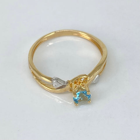 Anillo Solitario Entrelazado Circones Azul Cielo Y Blancos Oro amarillo y Oro blanco 18k / Talla 6 1/4 / 2,07 Gr *