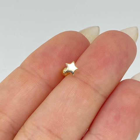 Piercing Estrella / Oro Amarillo 18k (Joya) / 0,3gr / 0.9cm / (Oreja)