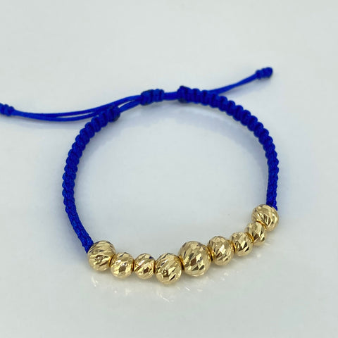 Pulsera tejida Bolas Diamantadas 9uni 7/6/5mm / Hilo Azul Oro amarillo 18k 1,19 Gr *