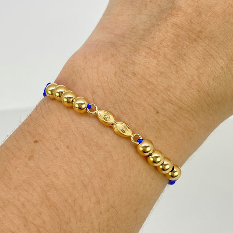 Pulsera tejida Herraje Ojos Santa Lucia / BL 8uni 5mm / Hilo Azul Oro amarillo 18k 1,16 Gr *