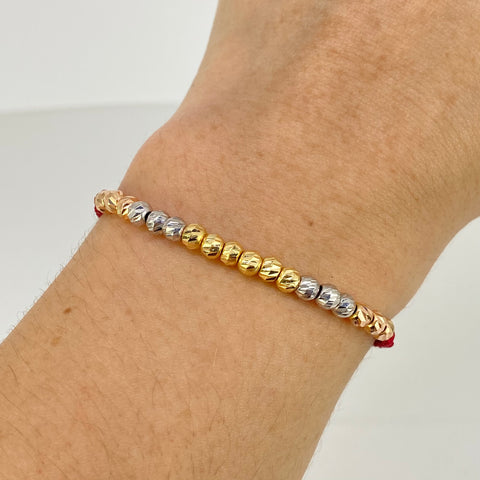 Pulsera tejida Bolas Diamantadas 18uni 4mm / Hilo Rojo Tres oros 18k 1,46 Gr *