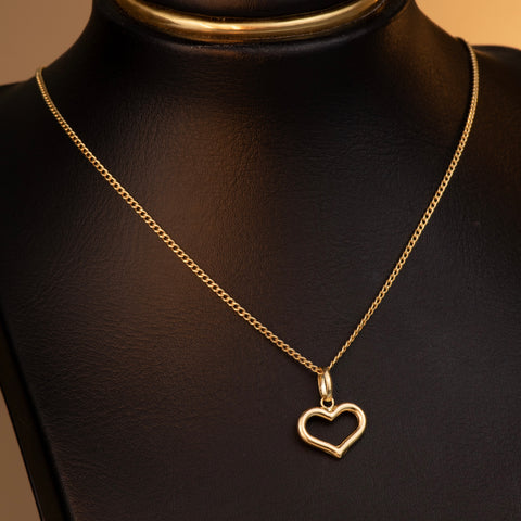 Set Cadena Cubana + Dije Silueta Corazón Oro amarillo 18k 1,90 Gr / 1,2 mm / 45 Cm