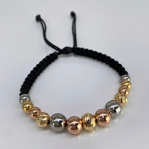 Pulsera tejida Bolas Lisas 8- 6 mm Y Diamantada 8 -7mm  Hilo Negro Tres oros 18k 3,19 Gr *