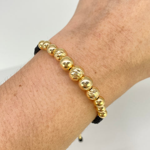 Pulsera tejida Bolas Lisas 7- 6 - 5 - 3 mm Y Diamantada 8 - 7 mm / Cilindros Hilo Negro Oro amarillo 18k 2,55 Gr *