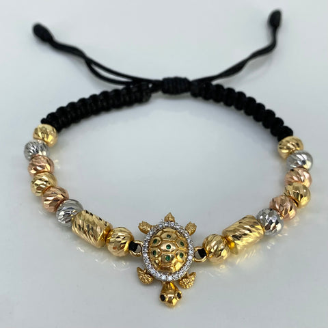 Pulsera tejida Tortuga / Cilindros / Bolas Diamantadas 14 Und 6 mm Hilo Negro Tres oros 18k 5,72 Gr †
