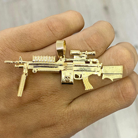 Dije Arma Con Circones POR FABRICACIÓN Oro amarillo 18k 16,42 Gr / 6,5 Cm  *